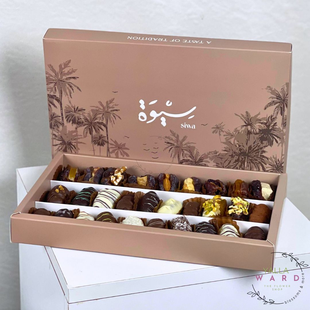 Box of assorted dates box with 'siwa' branding on a white background