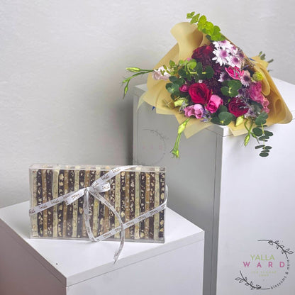 Bouquet of flowers and Chocolate Sticks,  with 'Yalla Ward' branding.