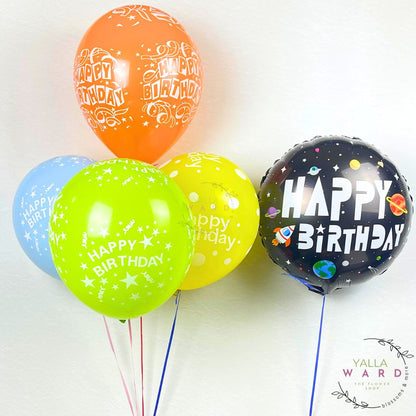 Colorful 'Happy Birthday' balloons on a white background with 'Yalla Ward' branding.