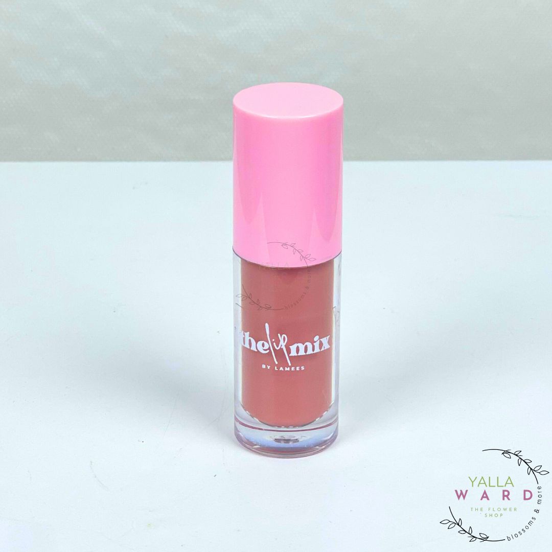 Lipstick with pink cap and body on a white background