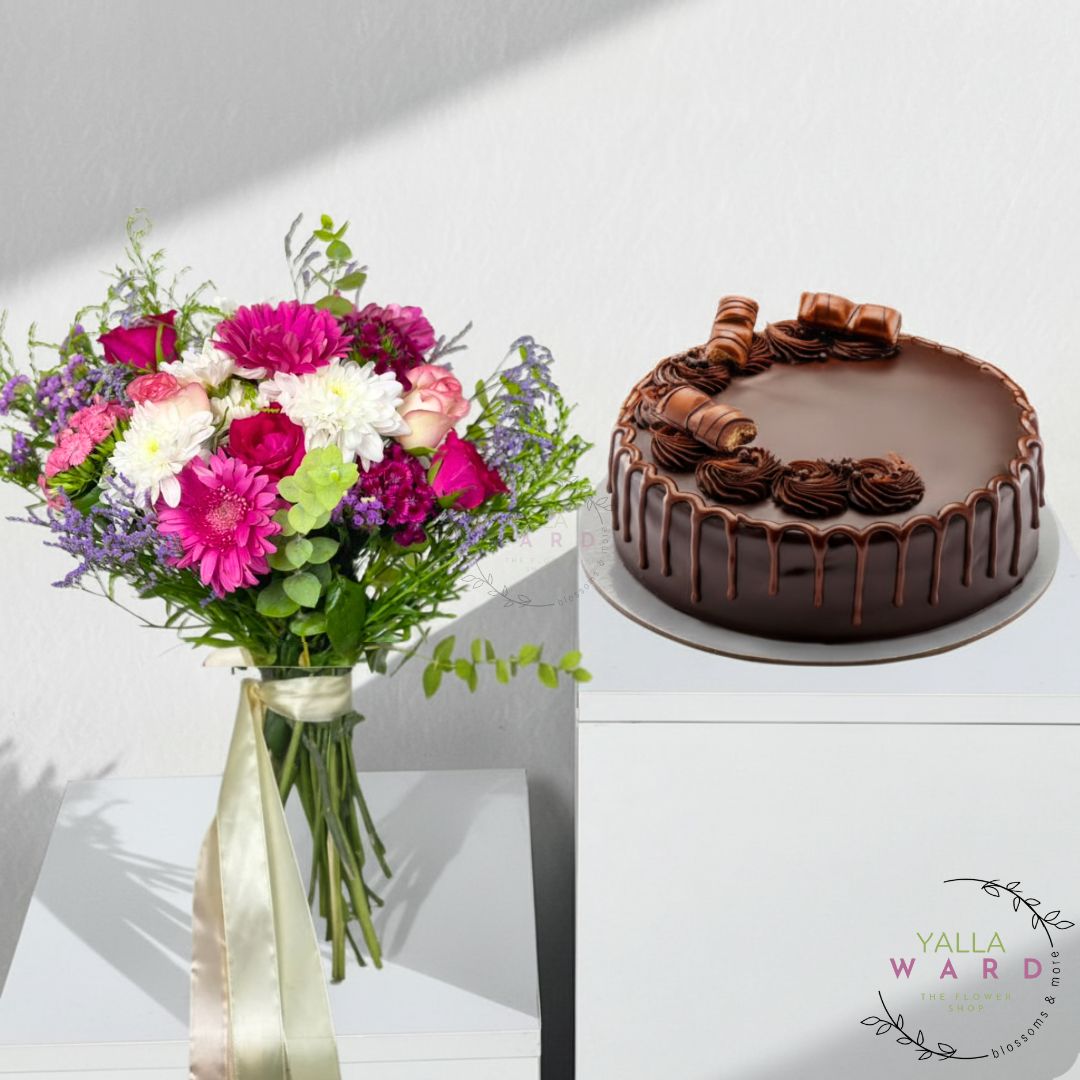 Chocolate cake and bouquet of flowers on a white surface with 'Yalla Ward' branding.